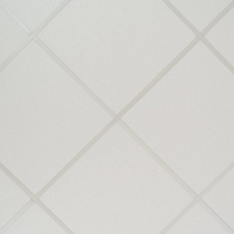 The texture of a false ceiling consisting of square plates and a directing profile of the diagonal arrangement, an abstract white background